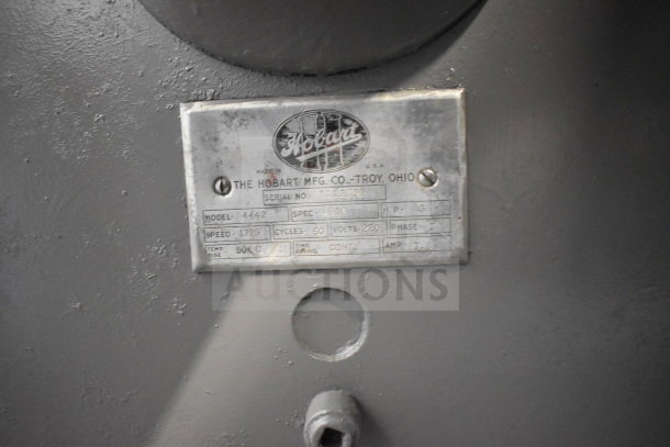Hobart 4442 Commercial Meat Grinder, metal plate shows specs: 220V, 3 Phase, 1725 RPM, 7.5 HP. In good condition.