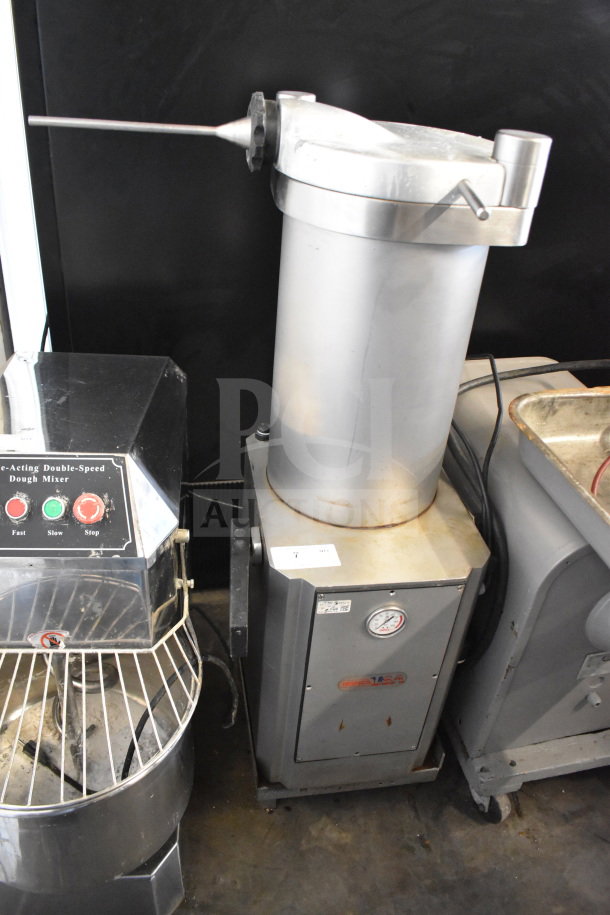 Mainca commercial sausage stuffer, floor style, 250V, 1 phase. Features vertical cylinder, pressure gauge. Good condition.