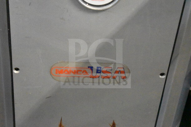 Mainca Commercial Sausage Stuffer, 250V, 1 Phase. Metal body with Mainca USA logo. Floor style unit in used condition.