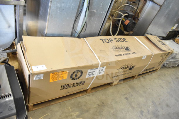 BRAND NEW SCRATCH AND DENT! 2019 Hoshizaki HNC-210BA-L-SLH refrigerated sushi display case in box, 83", fragile labels.