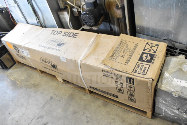 Brand new Hoshizaki HNC-210BA curved glass sushi display case, 83", in original packaging with "scratch and dent" labeling.