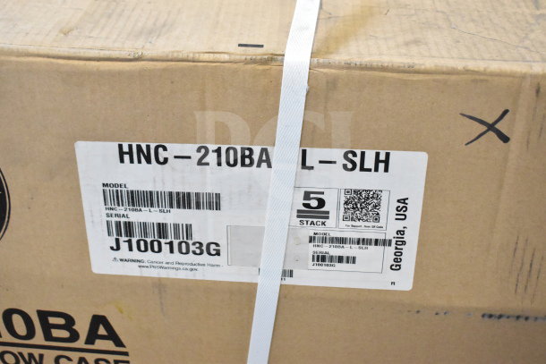 Cardboard box displaying Hoshizaki HNC-210BA-L-SLH model sushi display case label with serial number J100103G.