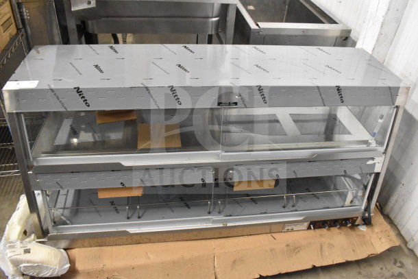 Hatco GRHD-4PD stainless steel Glo-Ray 58 1/2" dual shelf merchandiser, brand new with protective wrap visible.