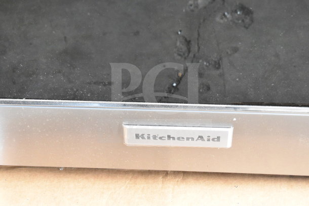 Brand new KitchenAid KOES530PPS01 convection oven, scratch and dent condition, label visible on stainless steel exterior.