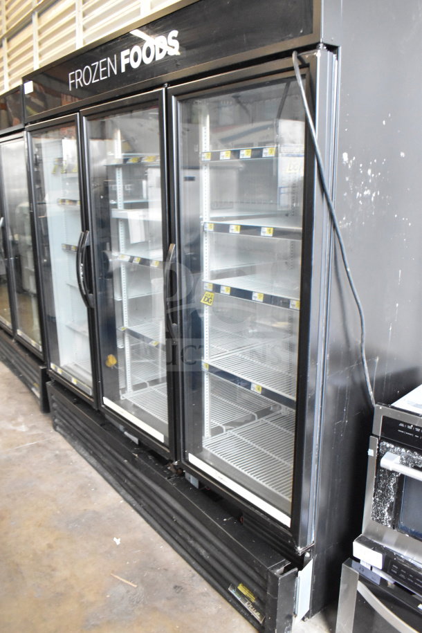2019 True GDM-72F-HC commercial 3-door freezer, black finish, clear glass doors, tested and working, voltage: 115/208-230V.