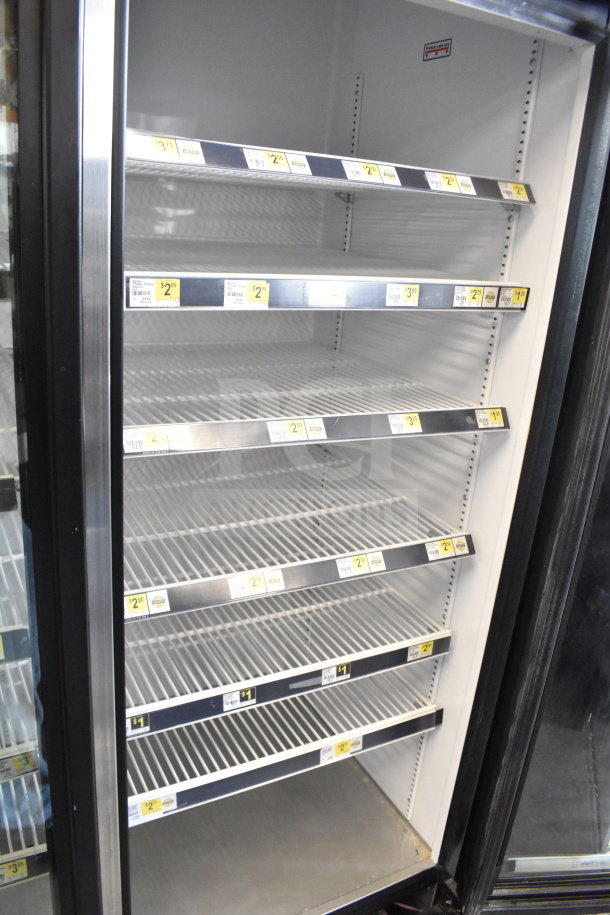 2019 True GDM-72-HC commercial cooler, 3-door, shelves with price labels, 115 volts, 1 phase, tested, working condition.