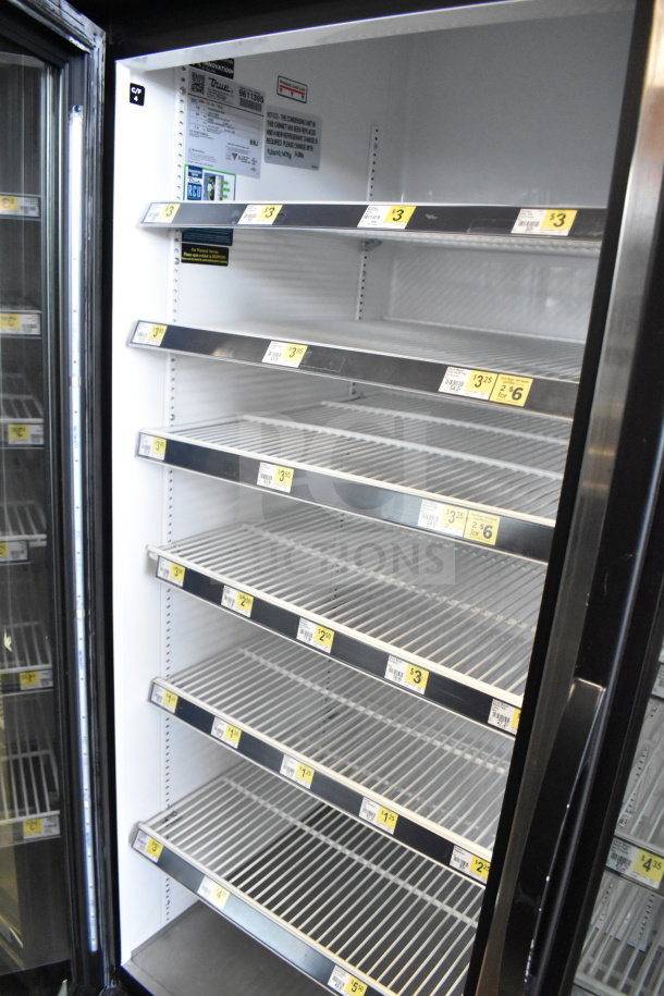 2019 True GDM-72-HC 3-door reach in cooler, commercial use, 115V, 1 phase, tested and working, interior view with shelves.