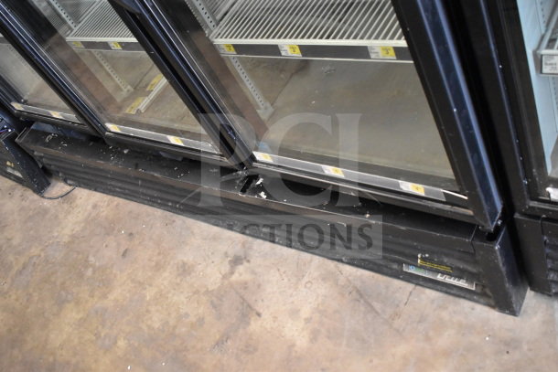 2019 True GDM-72-HC 3 Door Reach-In Cooler, tested and working. 115 Volts, 1 Phase. Black frame, clean interior shelves.