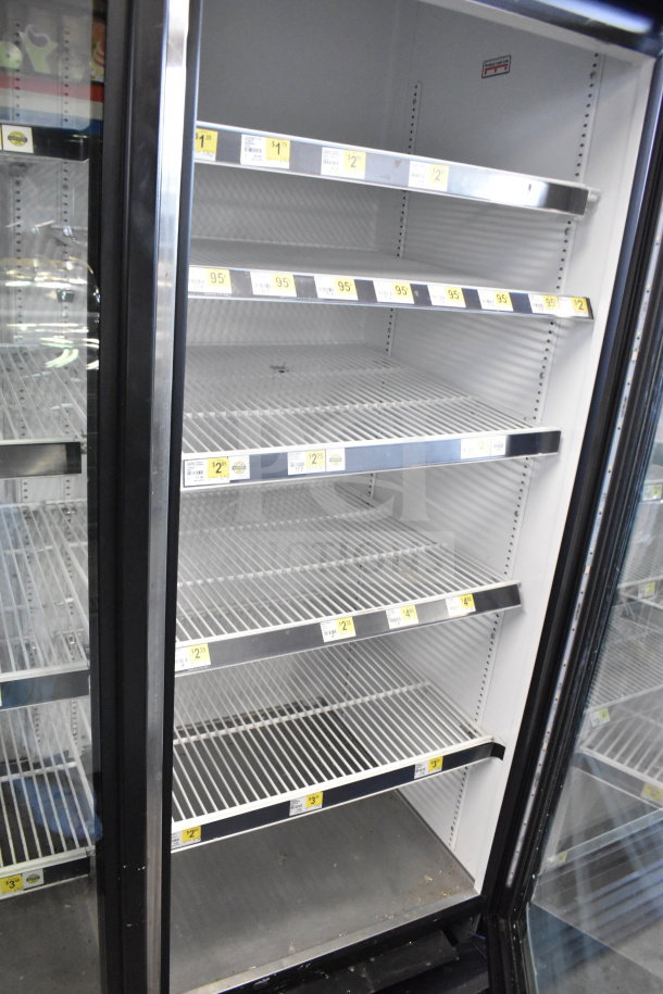 2019 True GDM-72-HC Commercial 3 Door Reach In Cooler with shelves. Tested and working. 115 Volts, 1 Phase.