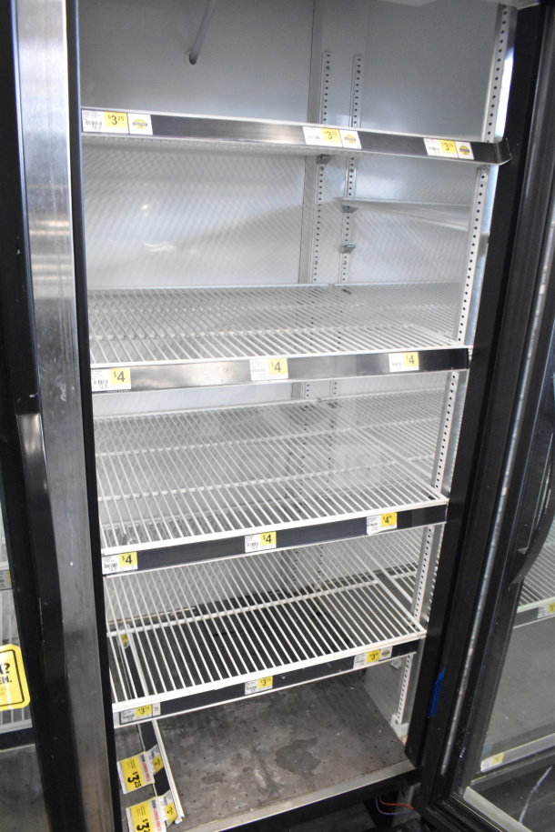 2019 True GDM-72-HC 3 Door Cooler Merchandiser, tested working. Features shelving, 115 Volts, 1 phase.