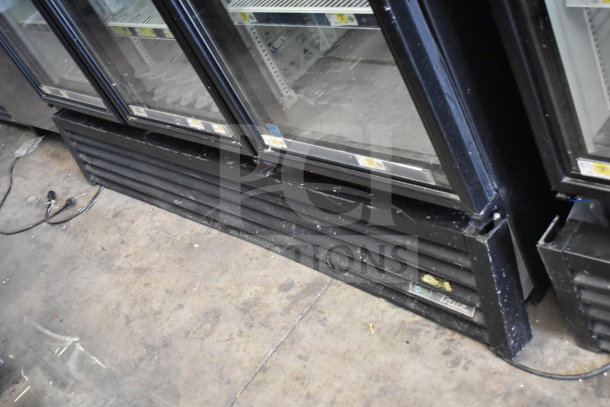 2019 True GDM-72-HC commercial 3-door reach-in cooler, black exterior, tested and working, 115 volts, 1 phase.