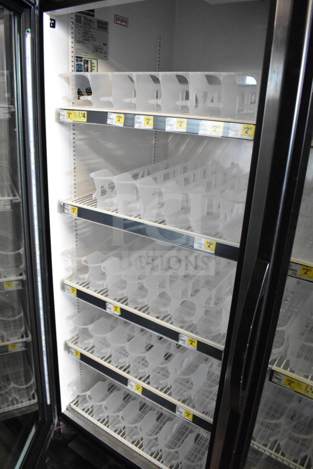 2019 True GDM-49-HC Commercial 2 Door Cooler, tested, working, 115 volts, 1 phase, interior shelves, price tags visible.