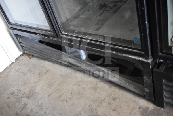 2018 True GDM-49-HC cooler, black frame, 2 glass doors. Visible wear at the base. Tested and working, 115 volts, 1 phase.