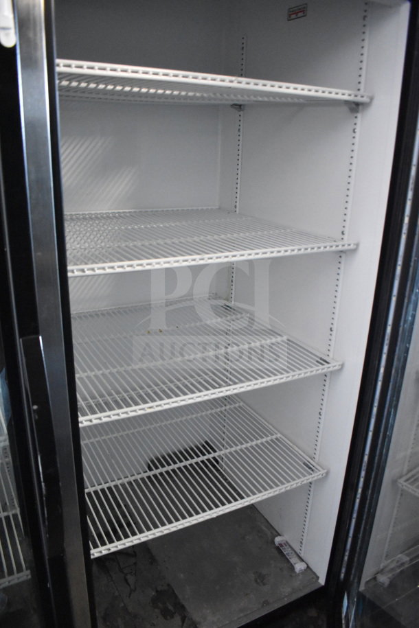 2018 True GDM-49-HC commercial 2-door cooler with adjustable shelves. Tested, working, 115 volts, 1 phase. Clean condition.
