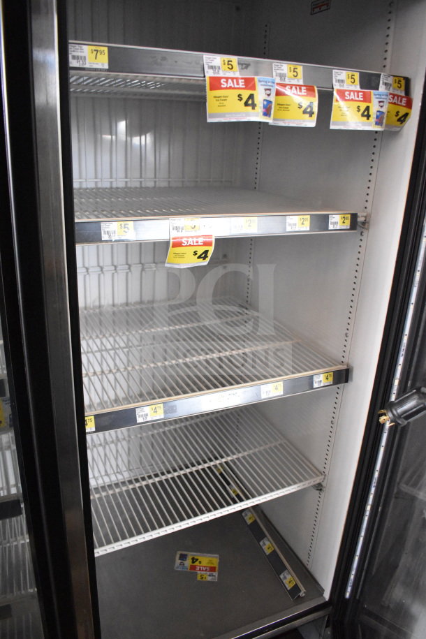 2019 True GDM-472F-HC commercial freezer merchandiser, 3 doors, shelves visible, tested and working, 115/208-230V.