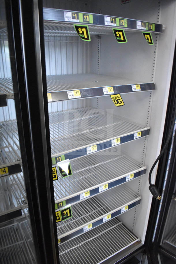 2019 True GDM-472F-HC commercial freezer, 3-door, clean interior, shelves with $1 signage, 115/208-230V, tested working.
