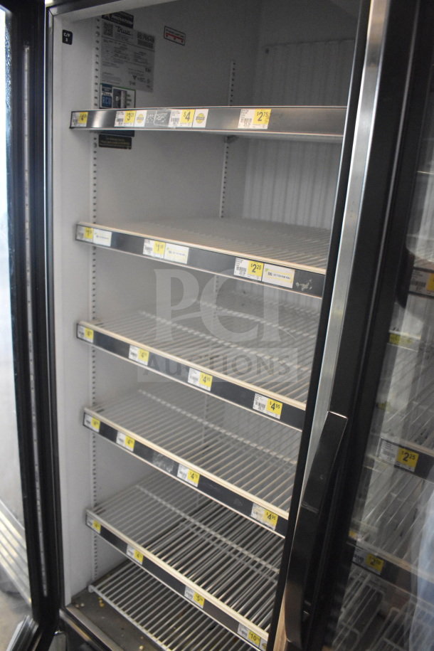 2019 True GDM-472F-HC commercial 3-door reach-in freezer merchandiser. Tested and working, shelves visible; 115/208-230V, 1 phase.