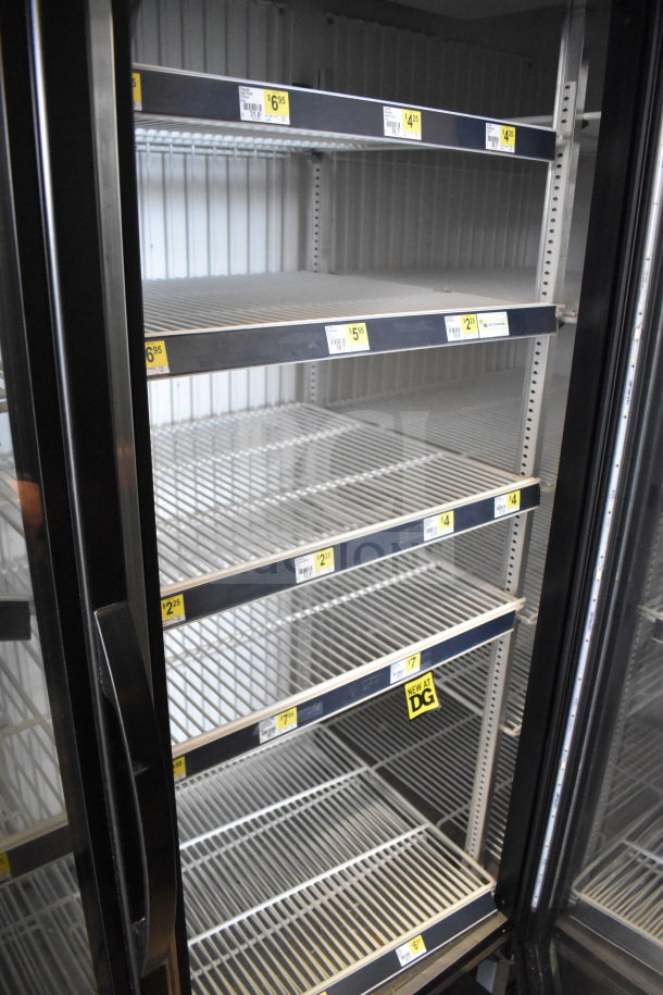 2019 True GDM-472F-HC 3-door reach-in freezer merchandiser, tested, working, 115/208-230V, 1 phase, shelves visible.