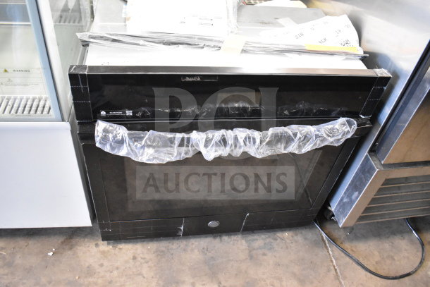 General Electric GE JTS5000DV2BB convection oven, brand new with broken glass. Black finish, commercial model.
