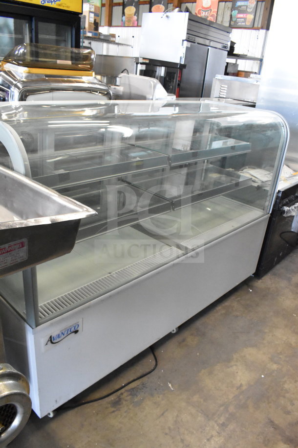 Brand new Avantco 193BC72HCW 72" refrigerated bakery display case with curved glass, white finish, minor scratches, 110-120V.