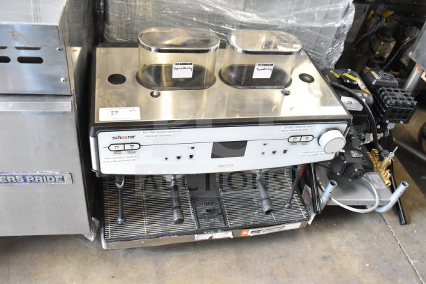 Schaerer Barista commercial 2-group espresso machine with 2 hoppers, 2 portafilters; visible labels and controls.