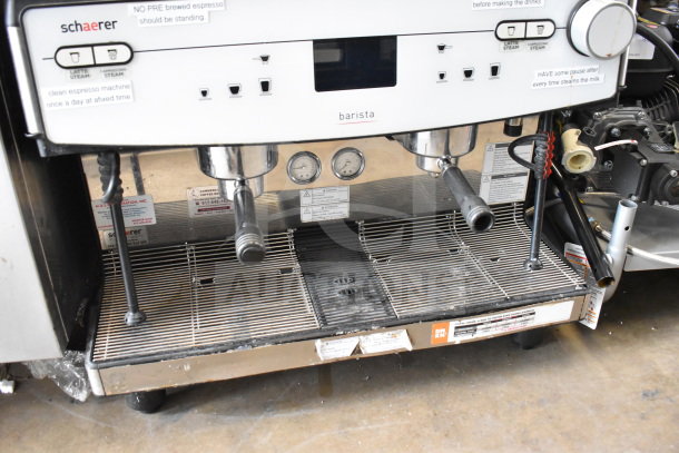 Schaerer Barista commercial 2-group espresso machine with dual hoppers and portafilters; countertop model, used condition.