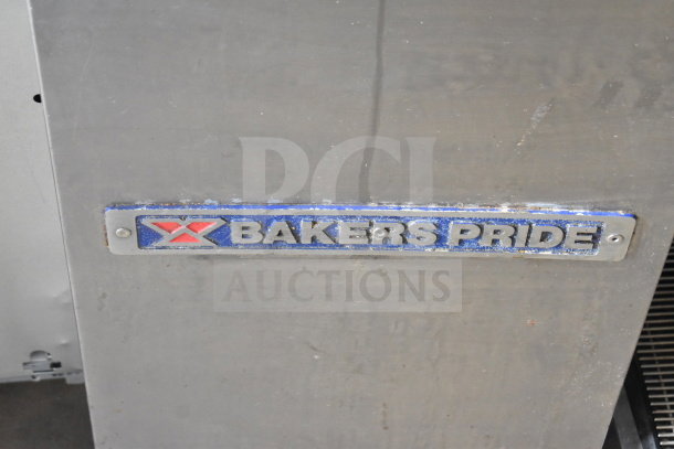 Bakers Pride logo on a commercial natural gas-powered deep fat fryer, 114,000 BTU, metal surface with slight wear.