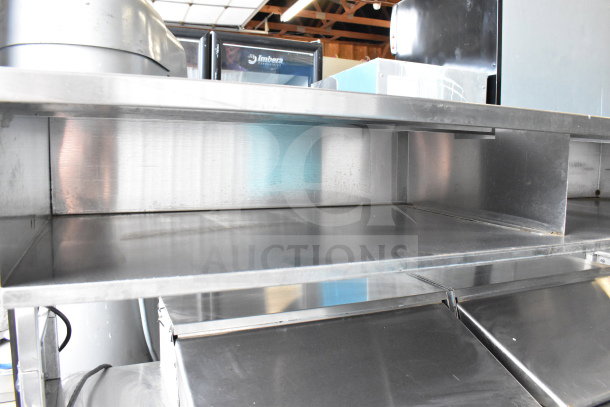 2017 Delfield UCD4464N-12-DD5 sandwich salad prep table with 4 drawers, over shelf, stainless steel finish, good condition.