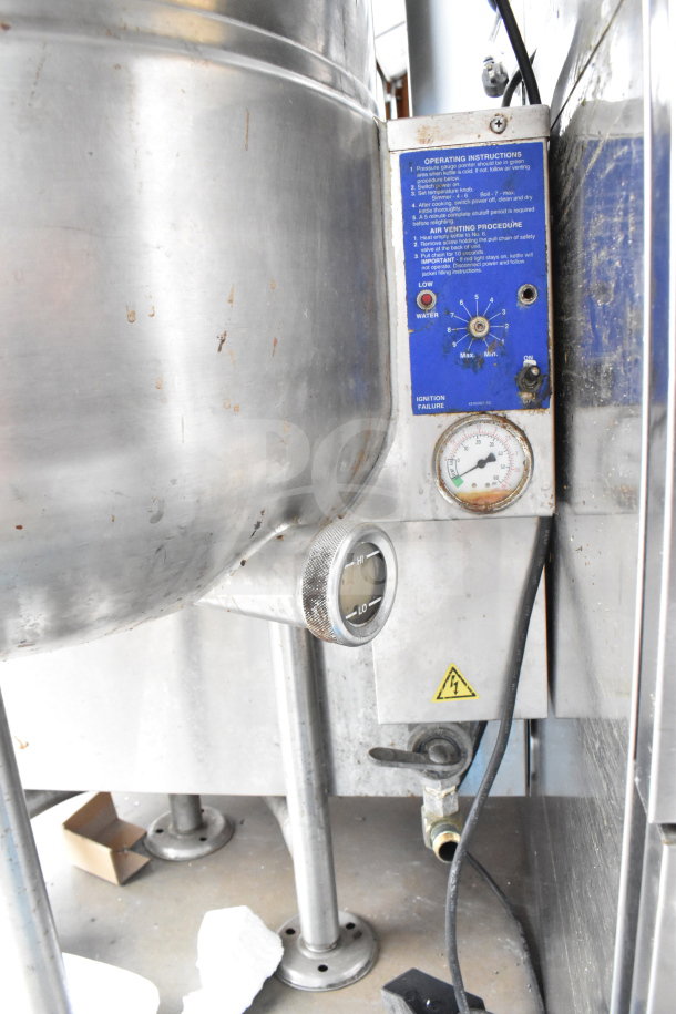 Cleveland KGL-40 floor-style 40-gallon steam kettle with visible gauge, operating instructions, and wiring. Good condition.
