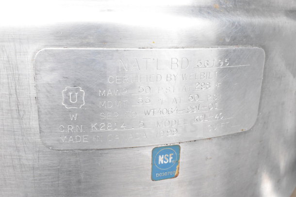 Cleveland KGL-40 steam kettle with 40-gallon capacity, NSF certified. Features include 50 PSI at 298°F, serial WT4064-991-01. Made in Canada.