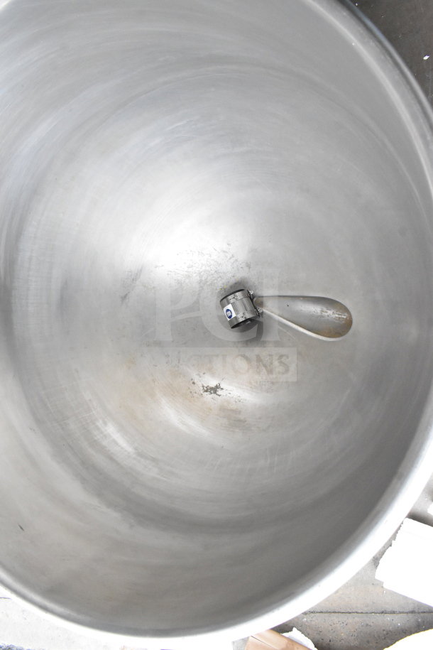 Cleveland KGL-40 commercial 40-gallon steam kettle, interior view, showing stainless steel surface with a mixer attachment.