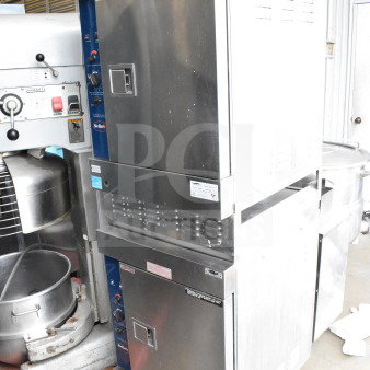 Stellar Sirius commercial natural gas 2-deck steam cabinet, 26,000 BTU. Stainless steel, controls visible. Good condition.