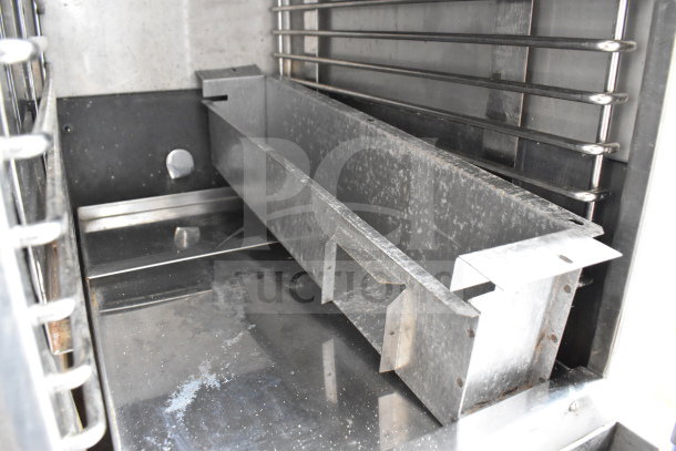 Stellar Sirius 2 Deck Steam Cabinet interior view, natural gas, 26,000 BTU, stainless steel, commercial use, clean condition.