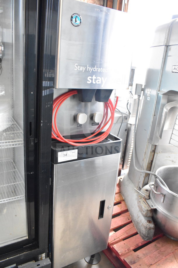 Hoshizaki DCM-270BAH-OS Commercial Icemaker on cabinet, 115-120V, stainless steel, ice and water dispensers, visible label.