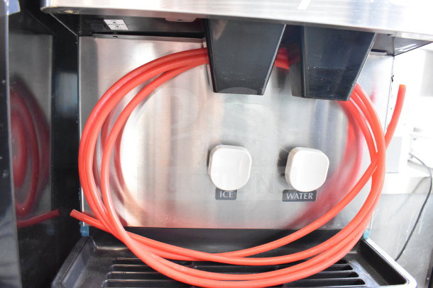Hoshizaki DCM-270BAH-OS Commercial Cubelet Icemaker with red tubing, ice, and water dispensers.