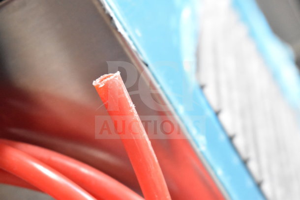 Close-up of the Hoshizaki DCM-270BAH-OS Commercial Cubelet Icemaker, featuring red tubing.