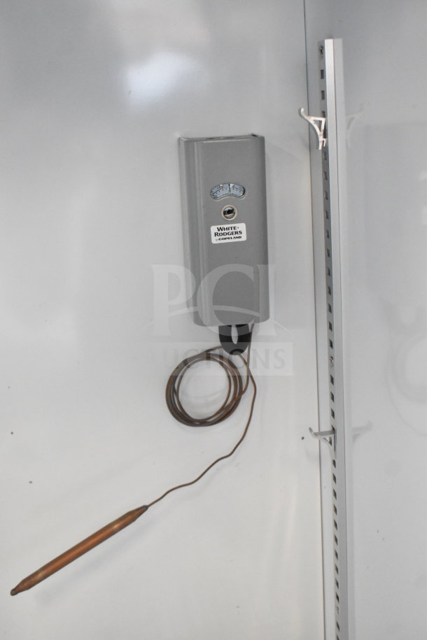 Bison SGM-35 commercial reach-in cooler interior, featuring a White-Rodgers control panel, shelf brackets. 115V, 1 Phase.