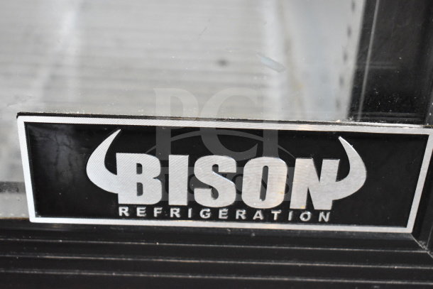 Bison SGM-35 commercial 2-door cooler with logo plate, 115 volts, 1 phase, black exterior, excellent condition.