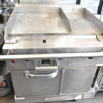 Southbend commercial flat top griddle with convection oven, stainless steel, on commercial casters, good condition.