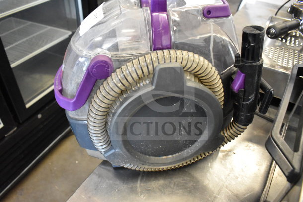 Bissell 2458 SpotClean PetPro Vacuum Cleaner, 115V, 1 Phase, purple handle, visible hose; used condition.