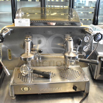 Faema E61 2 Group Espresso Machine with 2 portafilters and steam wand, stainless steel, commercial grade, good condition.