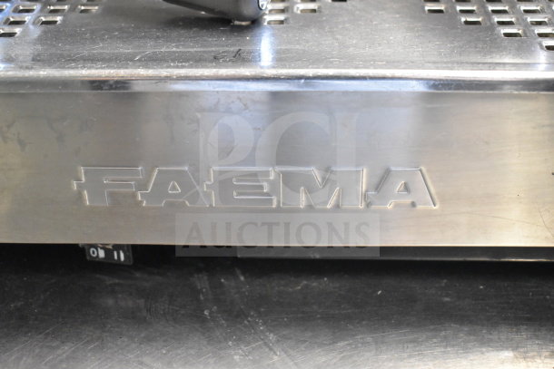 Faema E61 2 Group Espresso Machine, stainless steel with Faema logo. Includes two portafilters and steam wand.