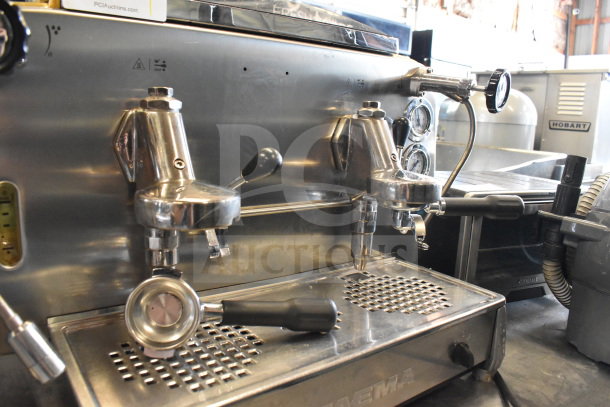 Faema E61 commercial espresso machine, 2 group, with portafilters and steam wand. Stainless steel, countertop model.