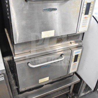 Two Turbochef NGC rapid cook ovens on stand, electric, 208/240V, 1 phase, visible control panels, professional use.