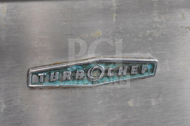 Turbochef NGC commercial oven label on metal surface, showing brand name and model identification.