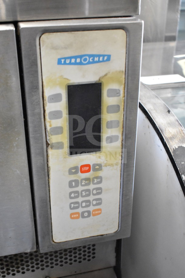 Turbochef NGC commercial electric rapid cook oven control panel, showing wear. 208/240V, 1-phase, on equipment stand.