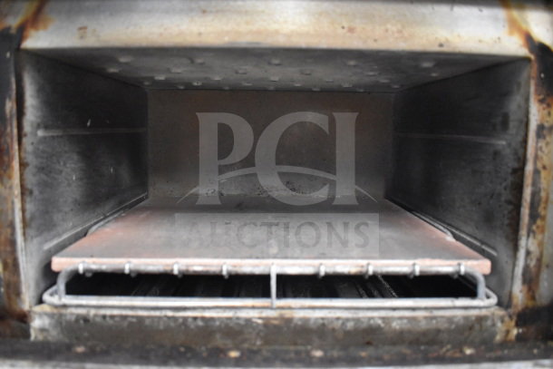 Interior of a Turbochef NGC rapid cook oven, showcasing cooking chamber condition, part of a commercial electric oven set.