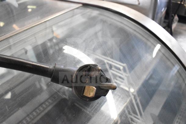 Power plug for Turbochef NGC Commercial Electric Rapid Cook Oven, 208/240 Volts, 1 Phase, on equipment stand.