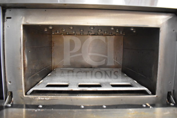 Turbochef NGC rapid cook oven interior, showing metal cooking chamber, used condition. Electric, 208/240V, 1 phase.