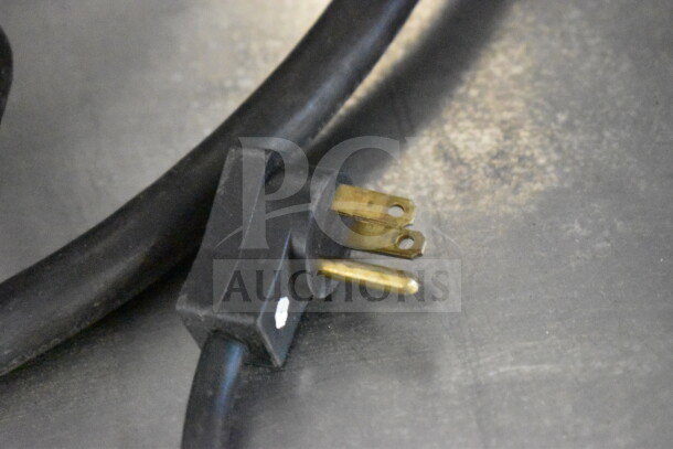 Beverage Air WTRF48A-1-SA-A commercial freezer plug; 115 volts, 1 phase, in good condition on stainless steel surface.